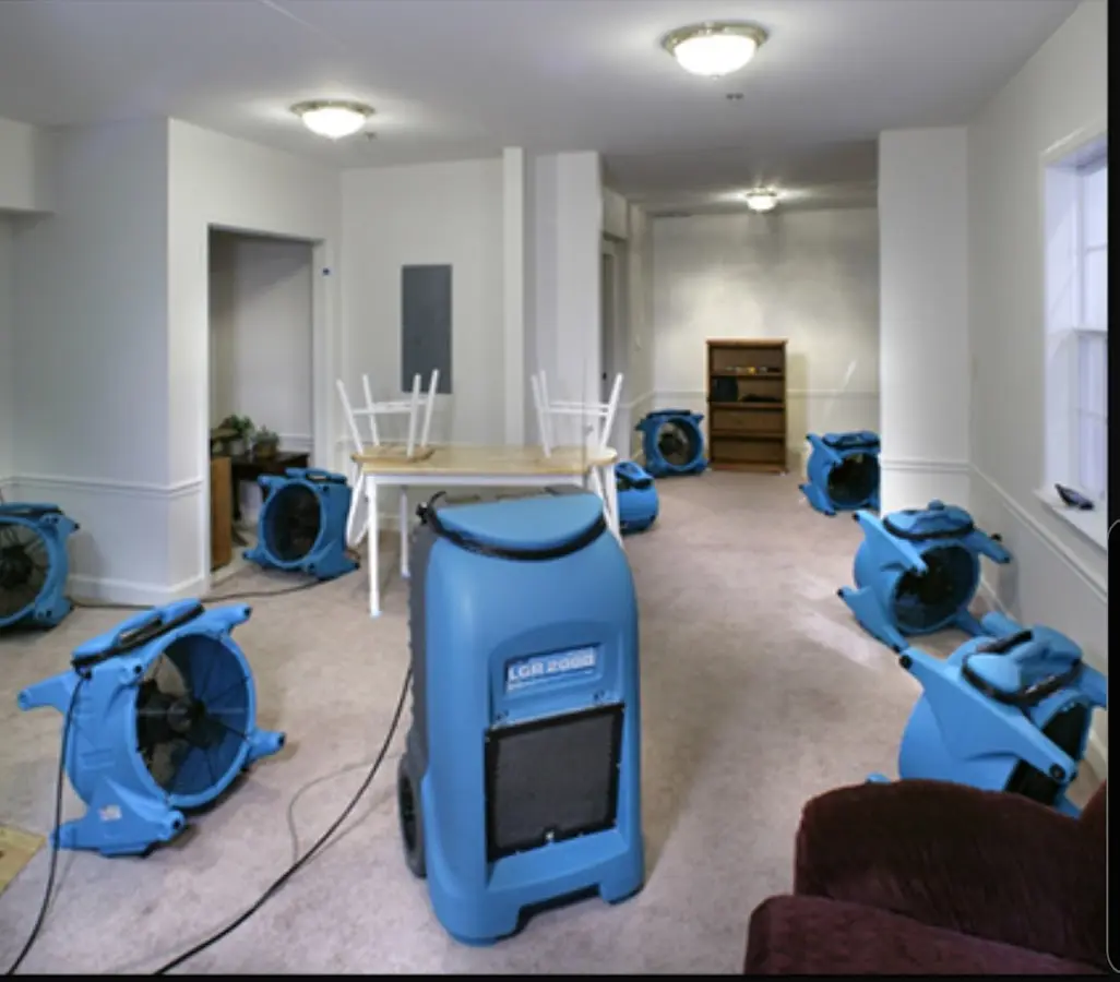 Air movers and dehumidifier setup for Water Damage Restoration in Eastman